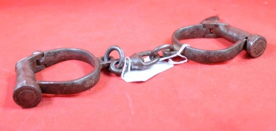 Hiatt antique handcuffs with key, stamped British Made