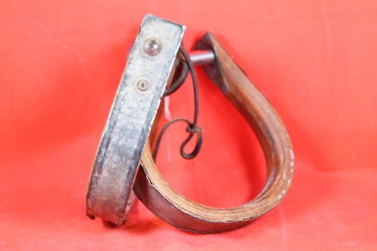 Pair of antique wood and metal stirrups
