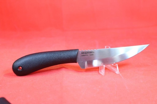 Cold Steel "Roach Belly" skinning knife with 4.5 inch blade. Plastic handle and plastic sheath. NIB