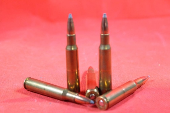 One blue plastic ammo box of reloaded 7x57 Mauser. 100 gr Nosler. Count 50.