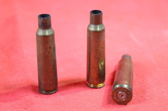Bag with 40 fired 250 Savage brass cases. One in Peters box.