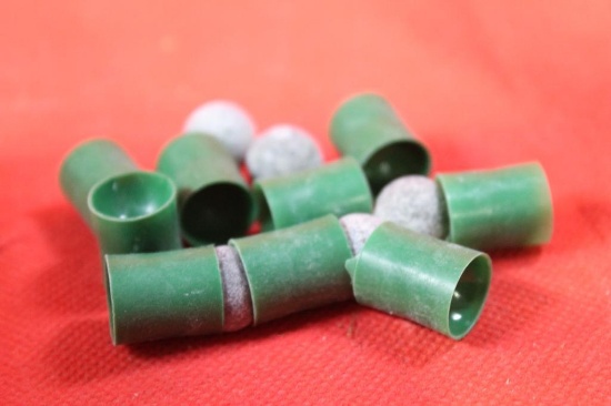 Bag of Lead round balls and green plastic wads.