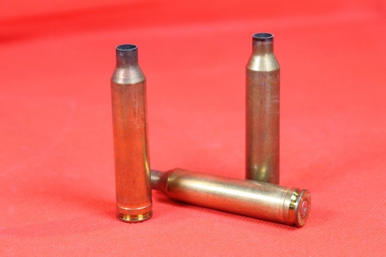 Two partial boxes of fired Winchester 264 Win Mag cases. Count 30.
