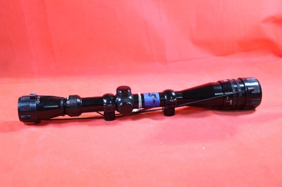 Tasco 6-24x40 with parallax, rail mount rings and scope covers. Like new.