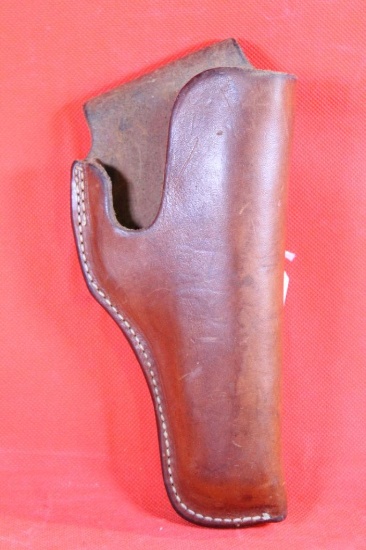 Brown leather right handed belt holster for 2-3" revolver. Used.