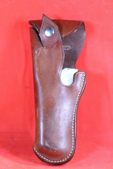 Ranger brown leather left handed belt holster for short barrel single action revolver. Used.