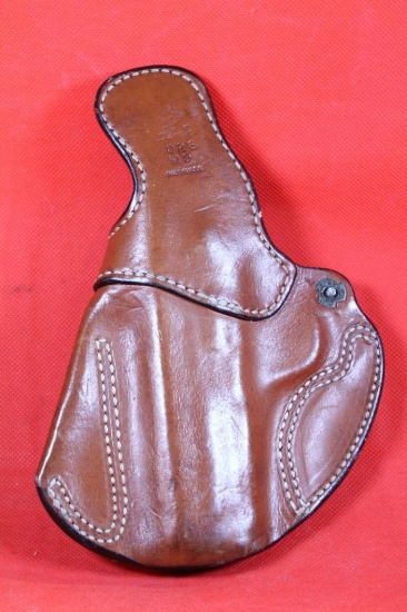 De Santis brown leather inside pancake holster for small automatic. Used.