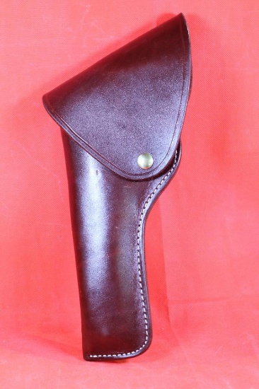 Dark red/brown leather left handed single action army style flap holster. Like new.