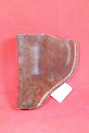 Brown suede leather left handed belt clip revolver 1" holster. Used.