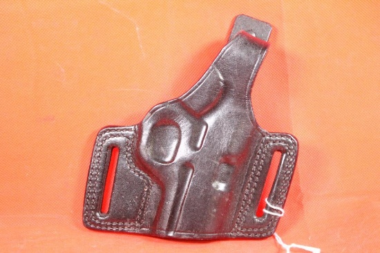 Black leather right handed snap holster with FBI cant for automatic. Like new.