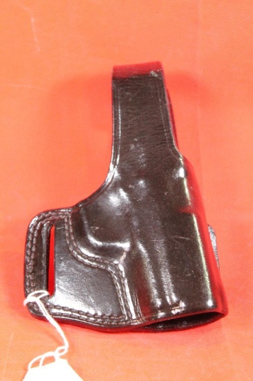 Don Hume black leather right handed large snap belt holster. Used in good condition.