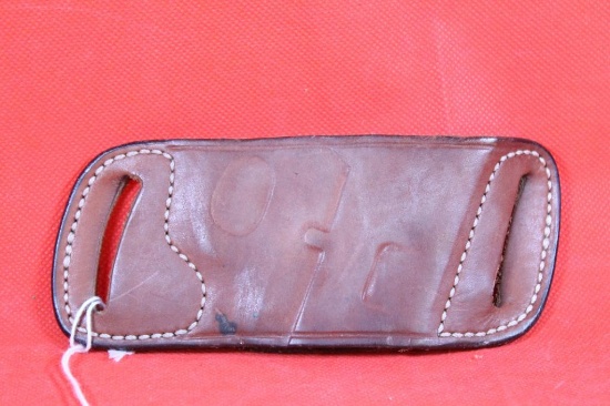 Brown leather right handed fold holster for automatic. Used.