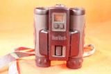 Bushnell compact binoculars with laser range finder, missing battery cover, Used.