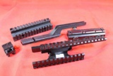 Picatinny rail mounts. Large baggy with 4 or 5 mounts.