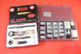 One box of miscellaneous lee reloading parts and one clear plastic box of 16 powder and lead shot