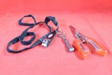 Fishing items. One pair of combination needle nosed pliers / scissors and a lanyard with two