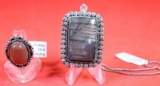 One German silver ring size 7 with a red sun stone and one german silver necklace with chain and a