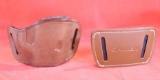 Two brown leather holsters. One Pro-Teck belt for automatic with FBI cant, right handed, used and