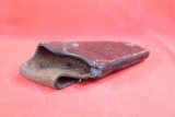 Brown leather right handed holster for small revolver. Used.