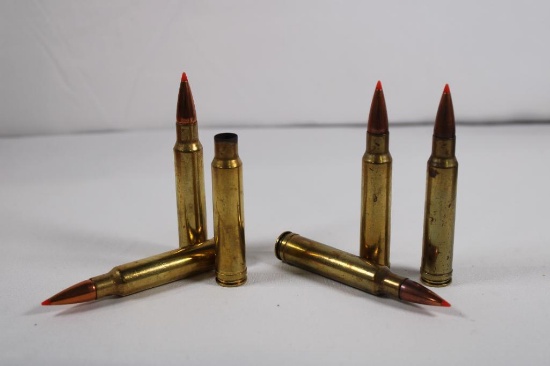 Two partial boxes of Hornady Superformance 338 Win Mag one 225 gr 4 count Ammo and 12 brass and one