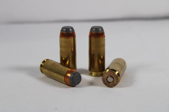 One full and one partial box of Samson .50 Action Express 300 gr Jacketed Soft Point Ammo, 33 count