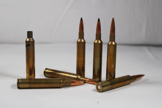 One plastic box containing 270 Win ammo, 42 count and one plastic box with 51 fired 270 Win brass