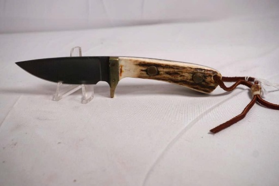 Small custom skinner with 3.0 inch blade. Stag handles. Nice leather sheath. Appears new with