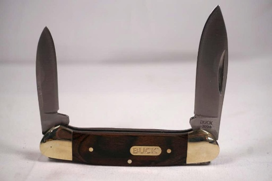 Buck Canoe model 389 with 2.5 inch main blade. Hardwood scales. NIB China.