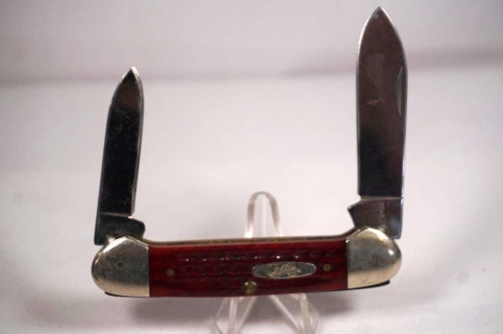 Case Canoe two-blade folder with 2.5 inch main blade. Jigged red bone scales. Used in good