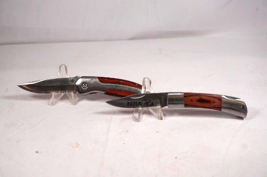 Two knives. One Winchester single blade linerlock folder with 2.5 inch blade. Pocket clip and wood