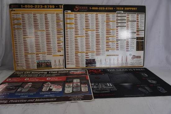 Two Sierra reloading mats, One Springfield XDM mat, and one Birchwood Casey mat