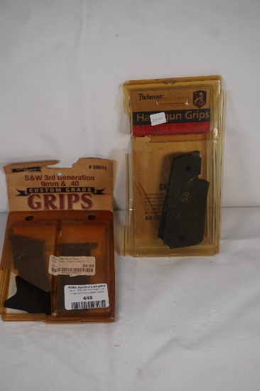 Two pistol grips. One Uncle Mikes for S&W 3rd gen 9mm & 40 and one Pachmayr for 1911.