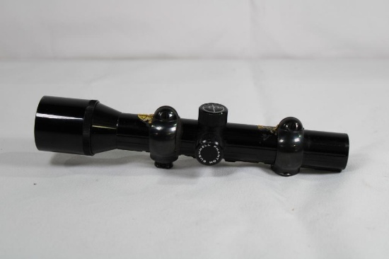 Tasco 1.5x pistol scope. with redfield rings. Used.