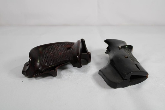 Two sets of polymer pistol grips. Used in good condition.