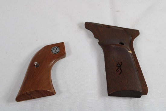 Two sets of wood pistol grips. One Ruger and one Browning. Used.