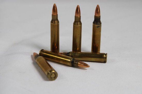 Yellow plastic ammo box with reloaded 223. Count 51.