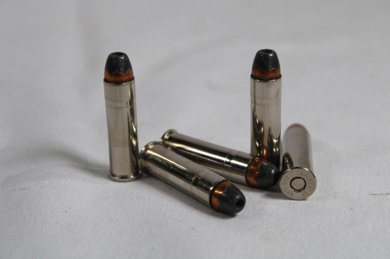 One clear smoke ammo box with 357 Mag JHP reloads. Count 32.
