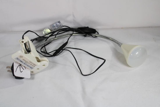 Clamp-on small table lamp. In good condition.