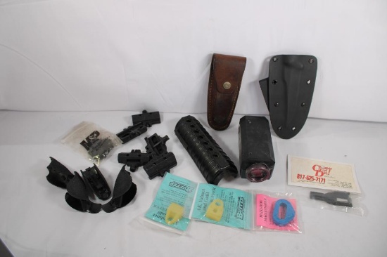 One bag of miscellaneous items including laser rail mount accessories, knife sheaths, recoil