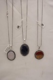 Three pendant necklaces