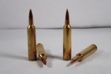 Two partial boxes of 26 Nosler Ammo, 15 count 140gr HPBT and 7 count 129gr ABLR, total count 22