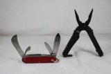 Gerber multi-tool with black finish. Has eight blades plus pliers and wire cutter. In original pouch