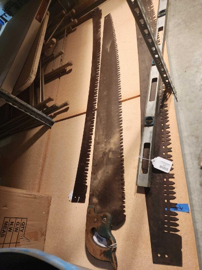 4 1/2 foot single man tree saw, also second 4 1/2 foot two man tree saw blade. Used.