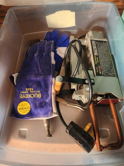 Large C-clamp, Chicago electric spot welder, pair of welding gloves and a three prong appliance