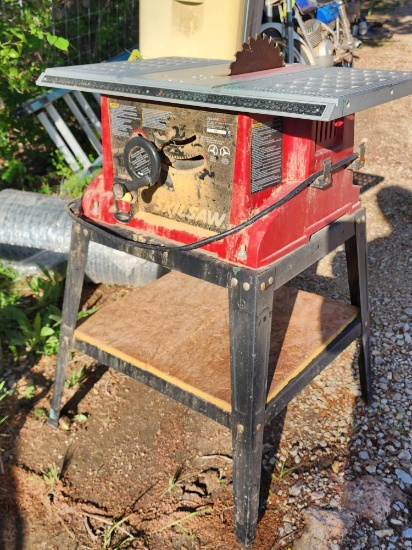 Skilsaw 10" table saw and extra metal stand Used.