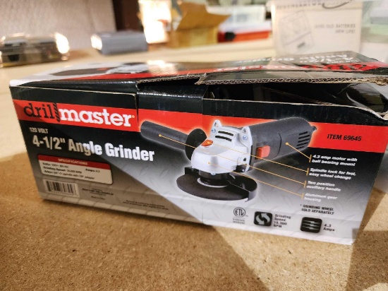 Drill Master 4 1/2" angle grinder. Open box but looks new.