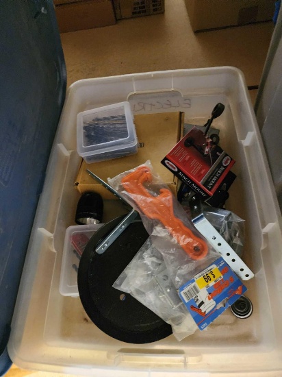 Plastic tub with miscellaneous items.