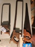 Two hack saws and one fine tooth hand saw. Used.