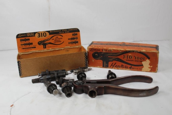 Lyman model 310, handloading press, with multiple dies for 22 Hornet. Used, in good condition.