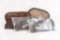 Five assorted sizes of padded pistol cases.